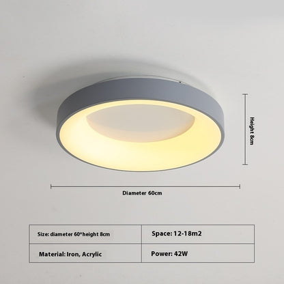 Iron base of the flush mount bedroom ceiling lamp mounted flat on a ceiling electrical box
