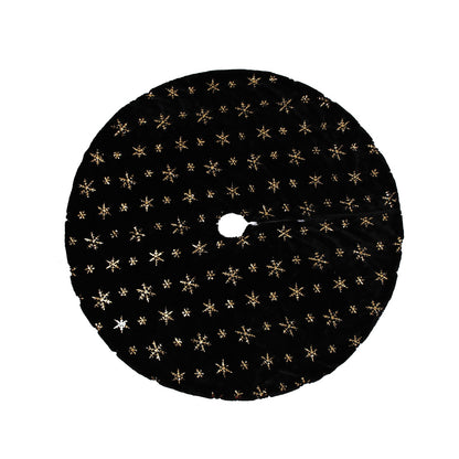Black velvet faux fur tree skirt with snowy Christmas tree display