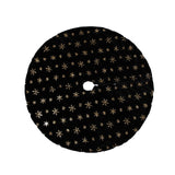 Black velvet faux fur tree skirt with snowy Christmas tree display