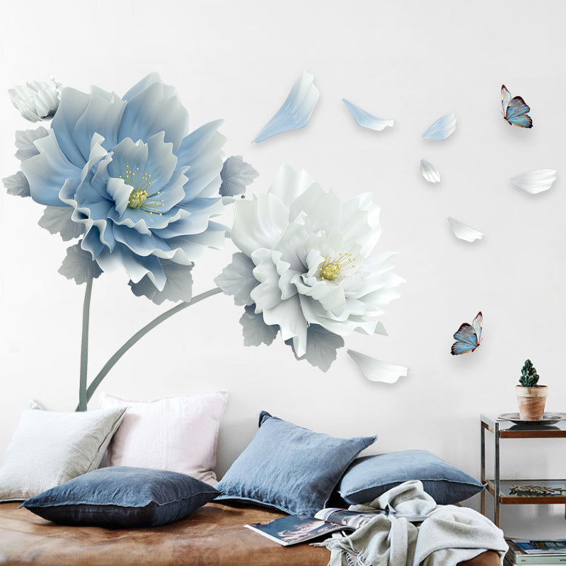 Blue flower wall sticker with butterfly detail close up