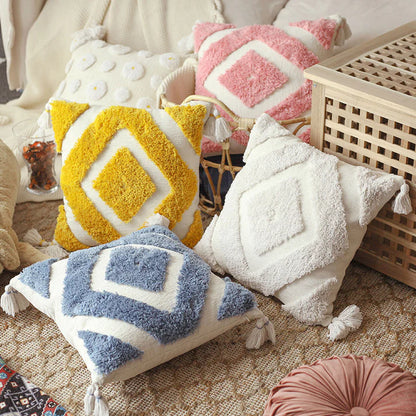 Yellow boho tufted pillow cover with tassel detail