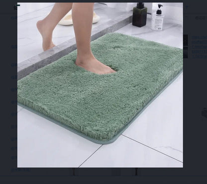 Close-up of the long dense chenille pile texture on the soft polyester floor mat

