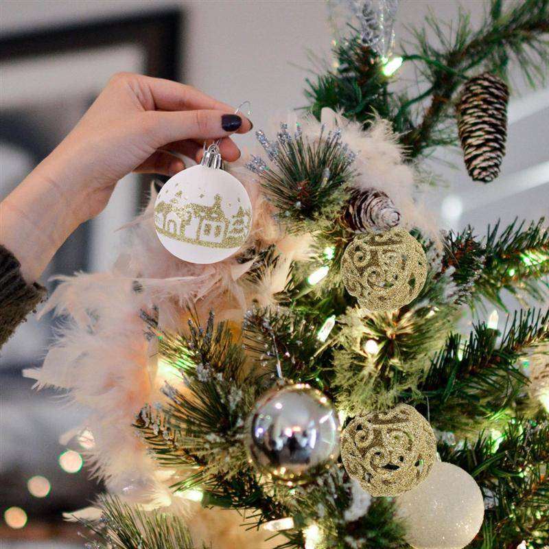 Christmas ball ornaments hanging on tree branches
