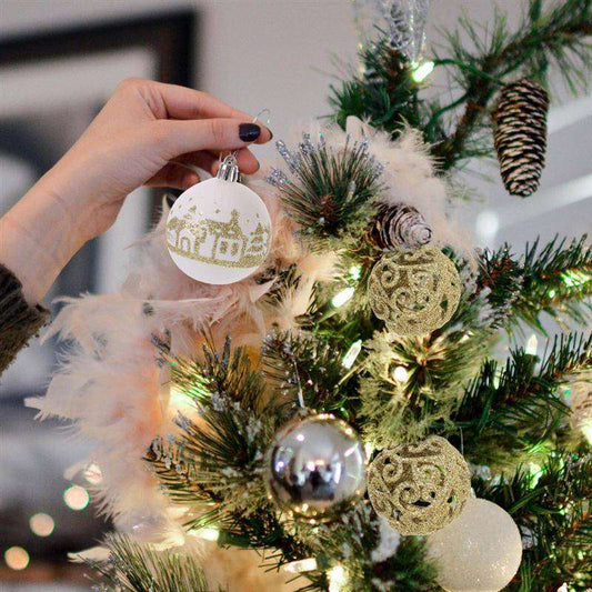 Christmas ball ornaments hanging on tree branches