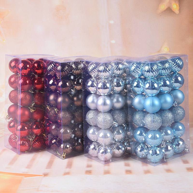 Mixed color Christmas balls hanging on tree