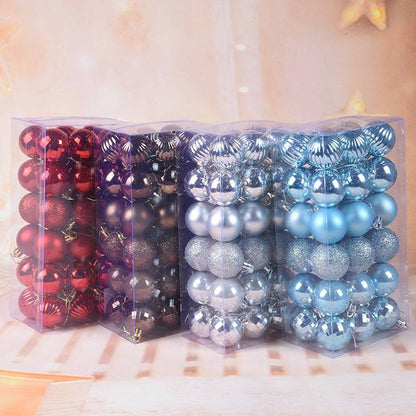 Mixed color Christmas balls hanging on tree