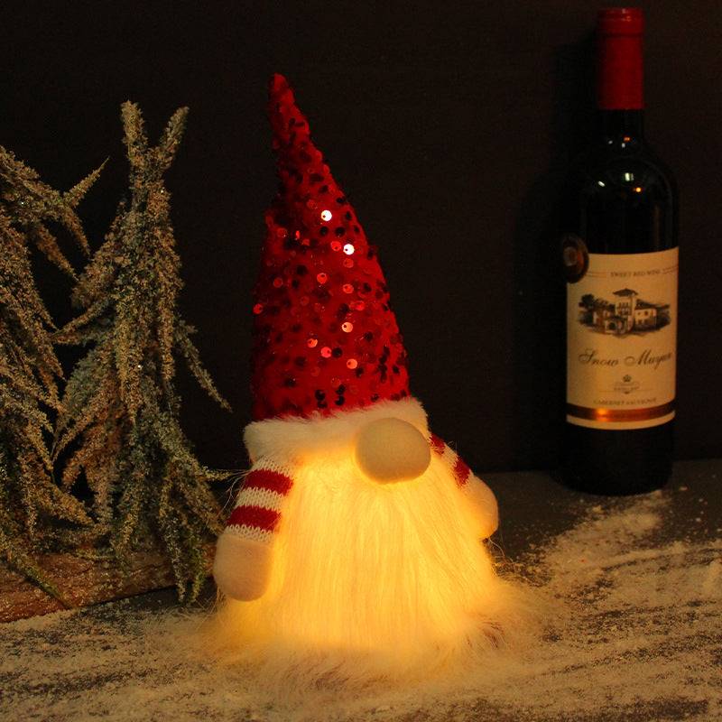 Christmas gnome ornament glowing in red