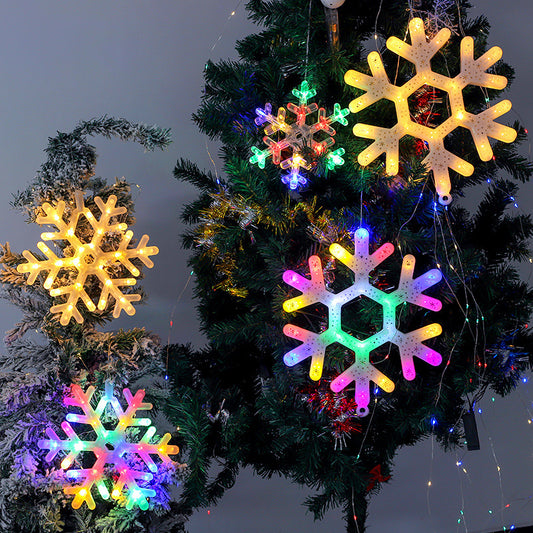Christmas LED snowflake modeling light warm white glow on Christmas tree display