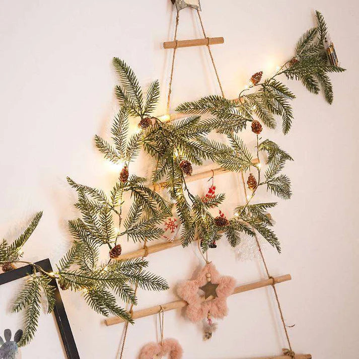 Christmas pine cone string LED light branch detail