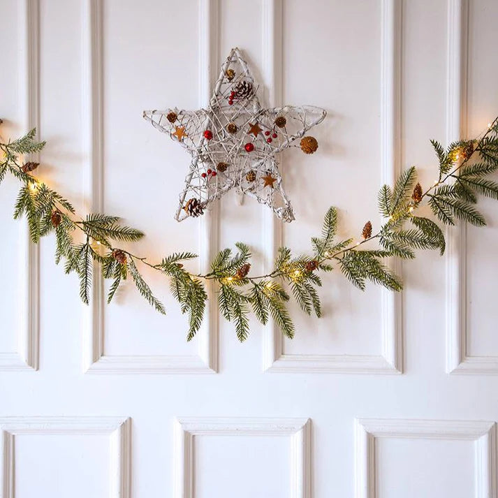 Christmas pine cone string LED light on door with star