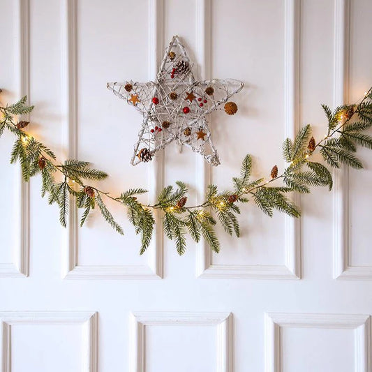 Christmas pine cone string LED light on door with star