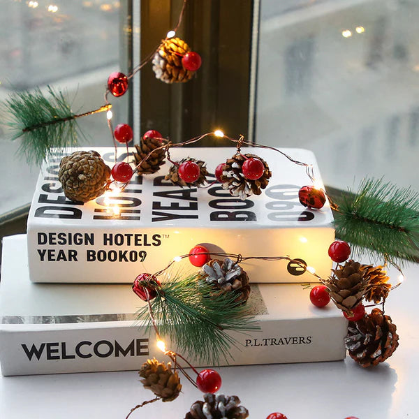 Christmas pine cone string lights glowing warm white for indoor home decor