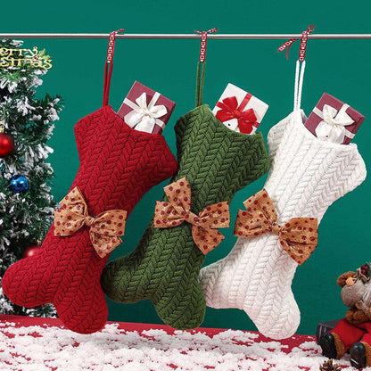 Christmas stocking with bow hanging on tree