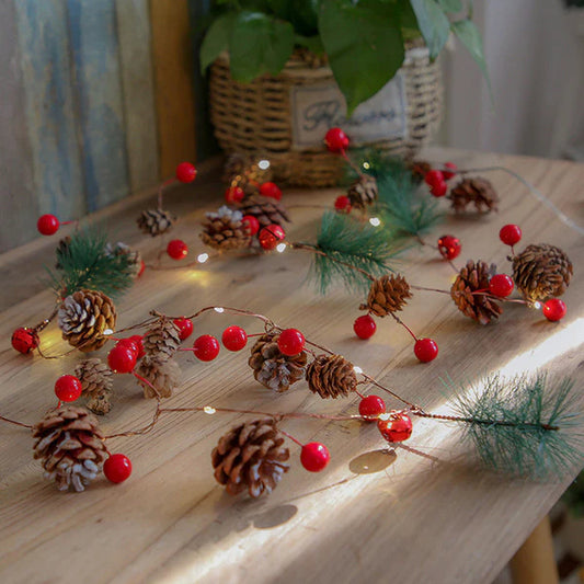 Pine cone string lights decorating bedroom wall for Christmas holiday season