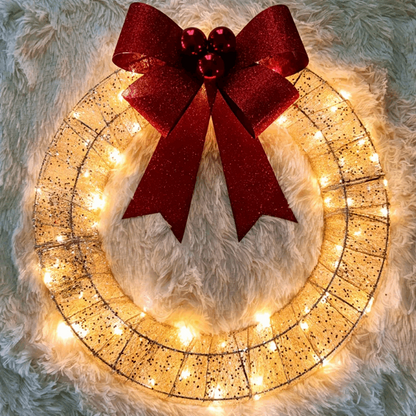 Close up of red bow detail on Christmas wreath