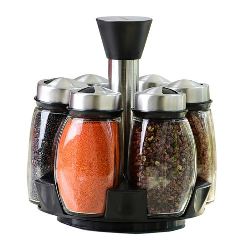 Close up of glass condiment jars with metal lids