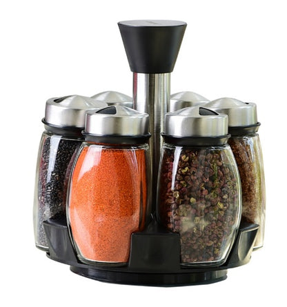 Close up of glass condiment jars with metal lids