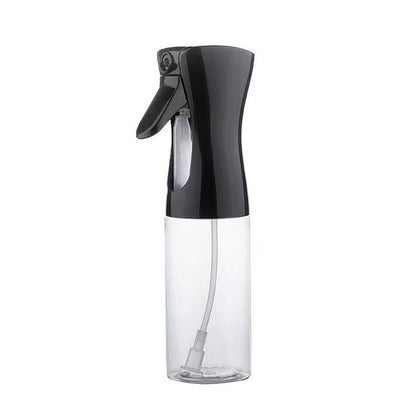 Continuous mist oil sprayer bottle in black with clear body