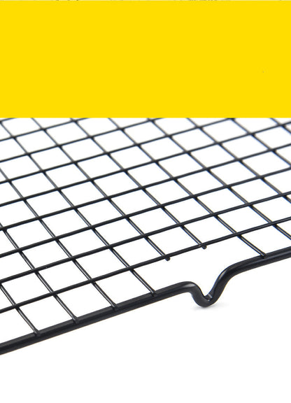 Cake cooling rack on yellow background showing full size