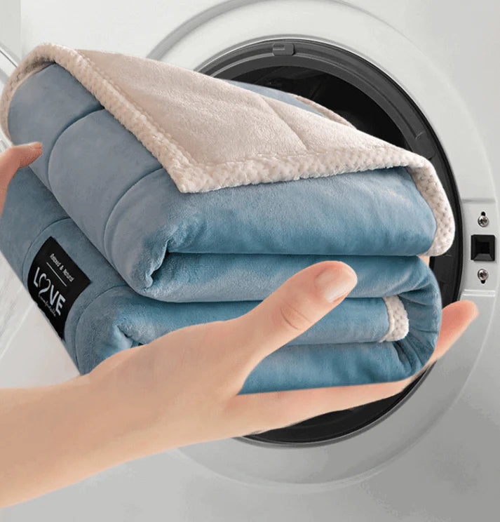Close up texture of soft coral fleece blanket