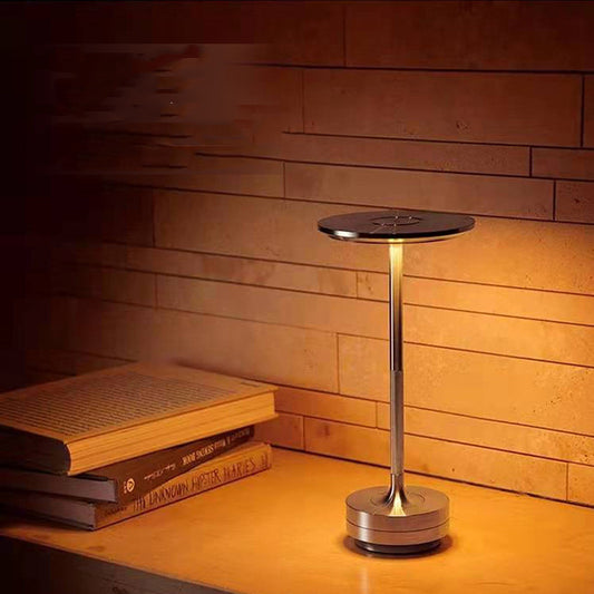 Cordless table lamp glowing with warm light