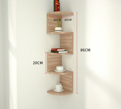 Corner lattice shelf with a small succulent, candle, and decorative item on each layer