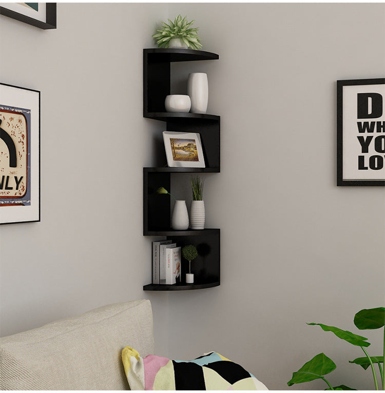 White 5-layer corner wall lattice shelf mounted in a bedroom corner with small decor items