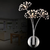 Crystal dandelion wall lamp lit with warm light