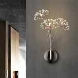 Crystal dandelion wall lamp glowing in dark hallway