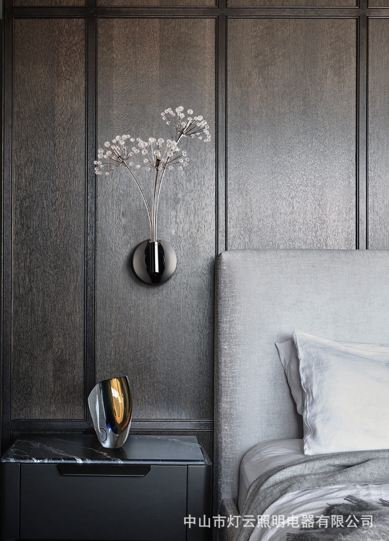 Crystal dandelion wall lamp mounted on gray wall