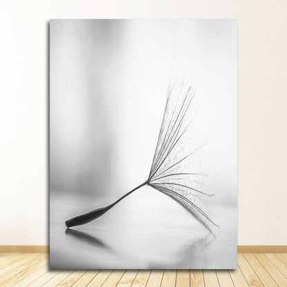 Black and white dandelion canvas painting on living room wall