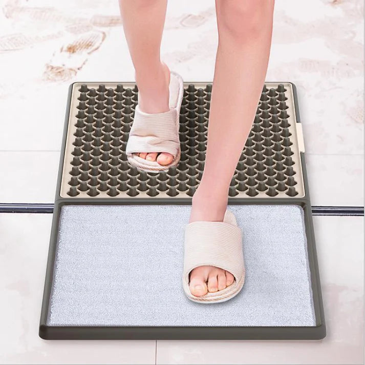 Disinfecting shoe sole cleaning mat in use at doorway entrance display