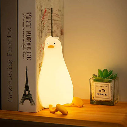 Flat duck lamp with USB charging cable connected