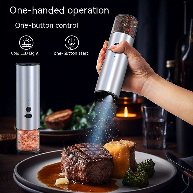 Electric salt and pepper grinder being used at dining table