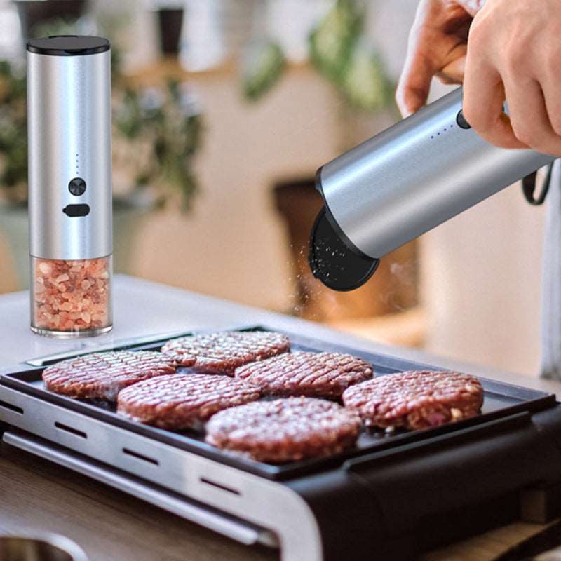 Electric salt and pepper grinder set on modern kitchen counter