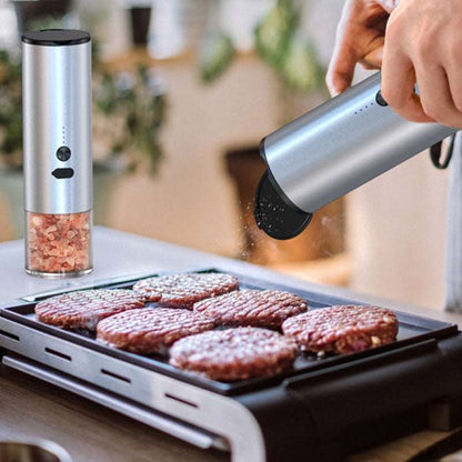 Electric salt and pepper grinder set on modern kitchen counter