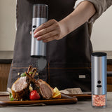 Electric pepper grinder showing LED light at base during use