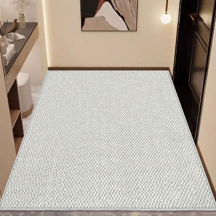 Non slip entrance door mat in beige pineapple pattern placed on home entryway floor