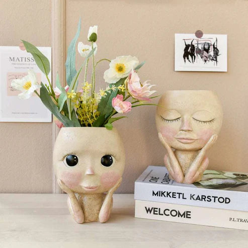 Face head sculpture planter with long eyelashes doll style