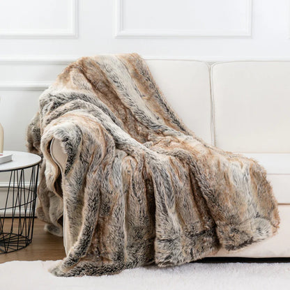 Faux fur throw blanket folded showing soft plush velvet texture and thickness