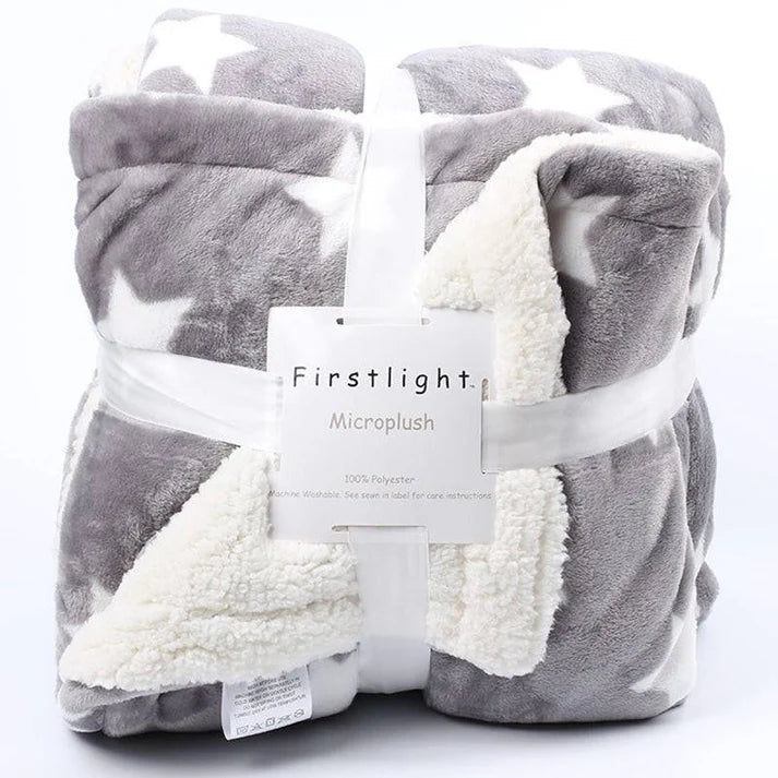 Fleece plush throw blanket rolled with packaging tag