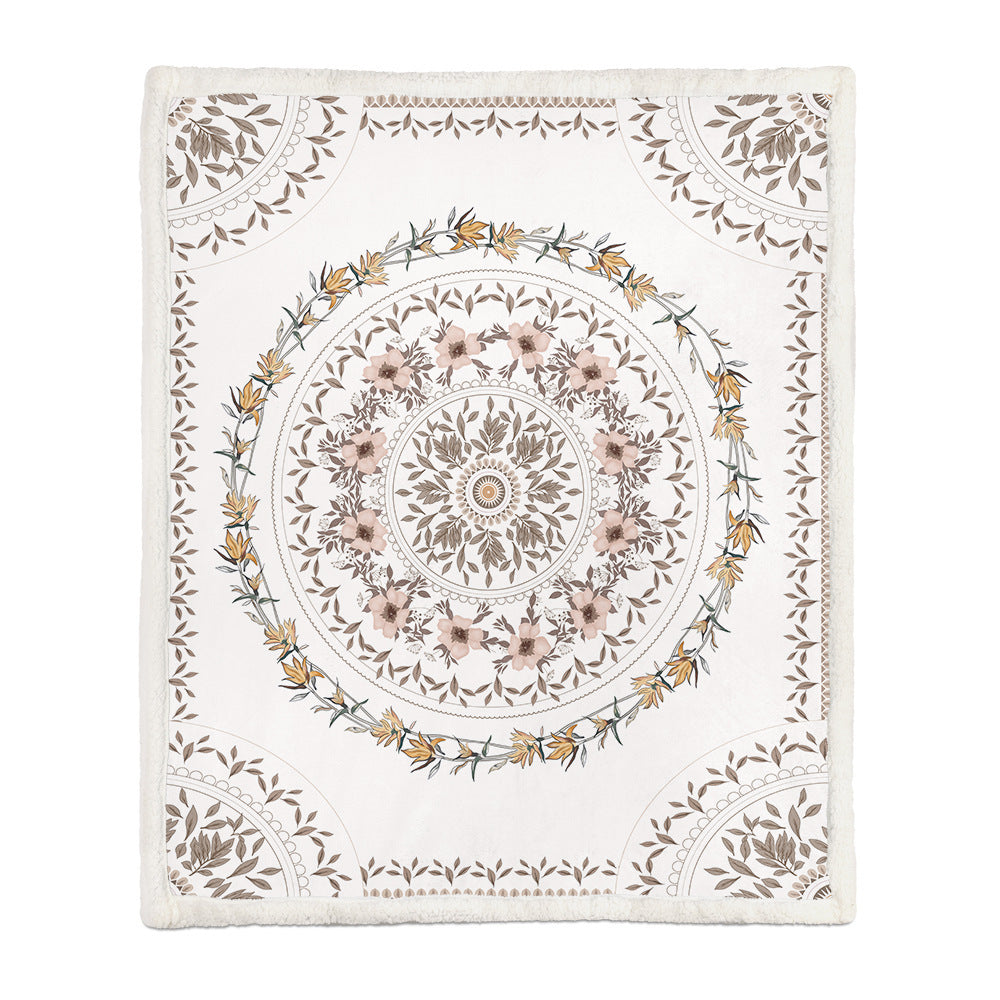 Close-up of the smooth plush polyester fabric texture of the botanical floral throw blanket
