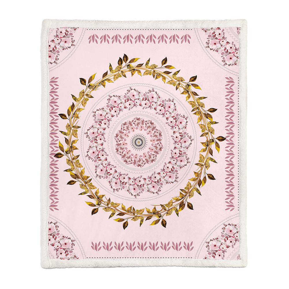 Care label on the floral throw blanket showing machine wash cold and tumble dry low instructions
