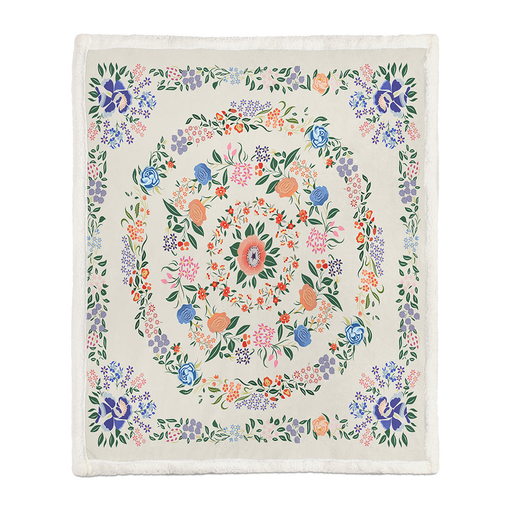 Close-up of the botanical leaves and flowers print on the soft polyester floral throw blanket
