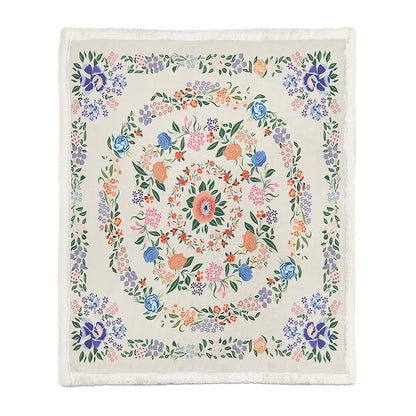 Close-up of the botanical leaves and flowers print on the soft polyester floral throw blanket
