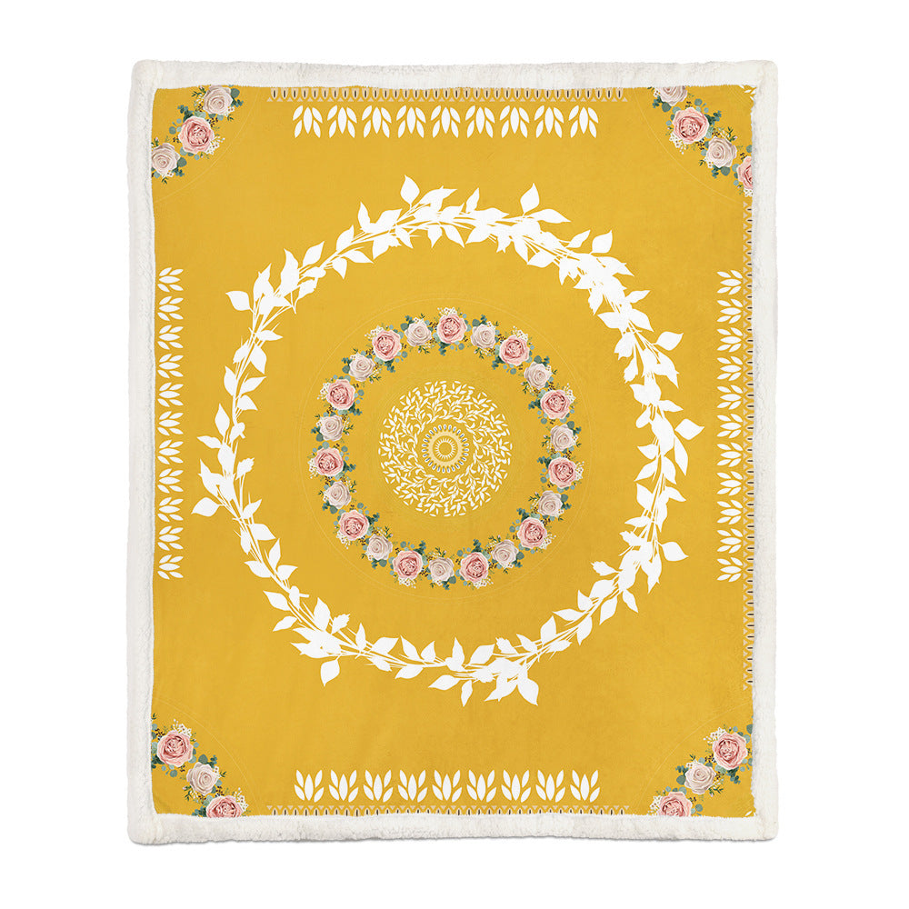 Lightweight floral throw blanket used in a reading nook chair during a summer evening indoors
