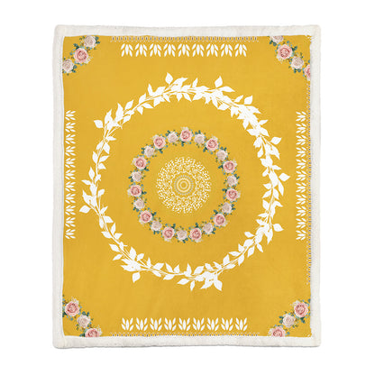 Lightweight floral throw blanket used in a reading nook chair during a summer evening indoors
