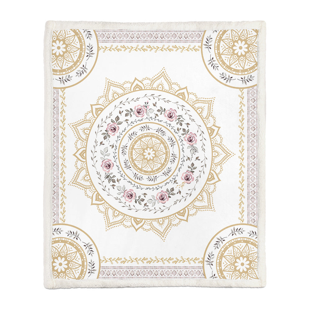 All three sizes of the floral throw blanket laid flat side by side on a neutral surface
