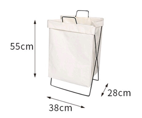 Large foldable fabric laundry hamper sitting on a closet floor holding sorted clothes
