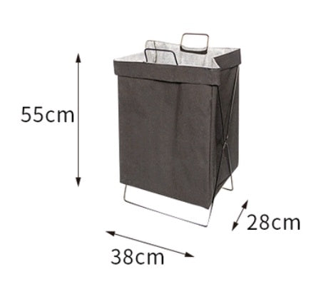 Foldable laundry hamper popping open showing the structural frame holding it upright
